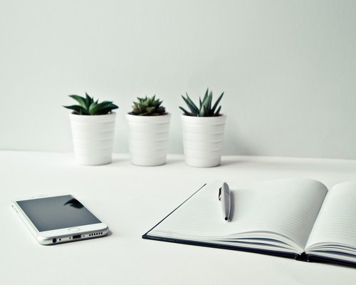 Well-lit modern office workspace organized for comfort